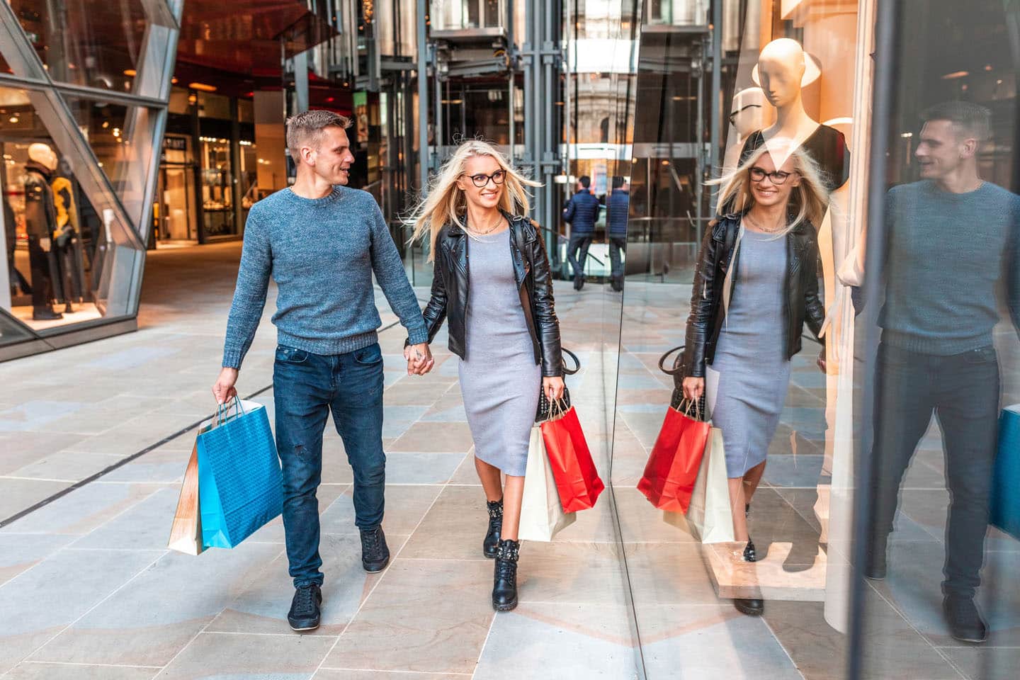 man and woman shopping on fifth avenue