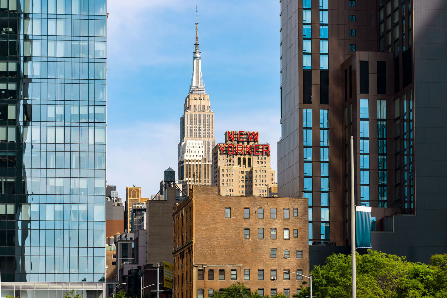 new yorker hotel view on sunny day in manhattan